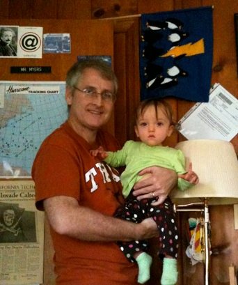 Eric Myers in his office with his daughter, Amanda